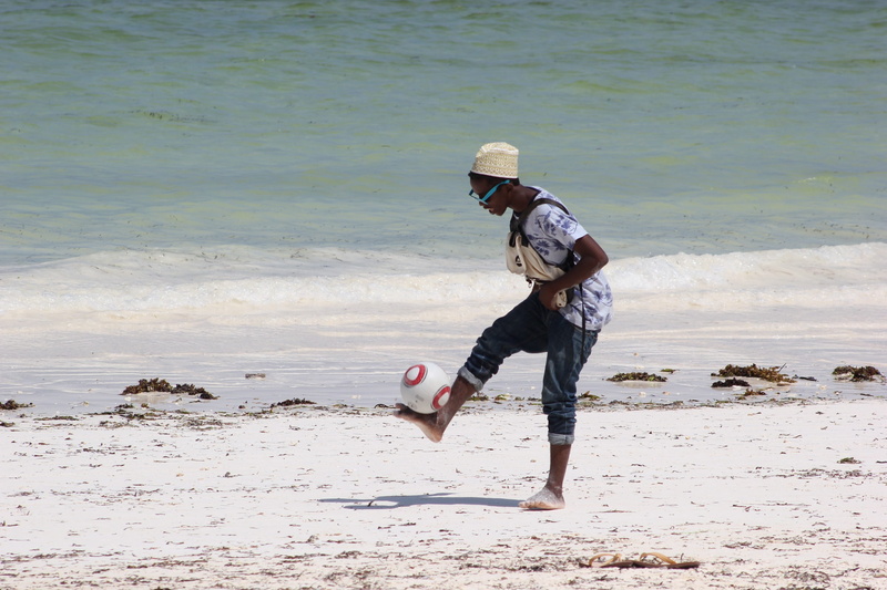 casual clothing, muslim, hat, warm clothing, beach, Tanzania, outdoors, sea, Football, kid, nature, Zanzibar, playing, side view, beauty in nature, water