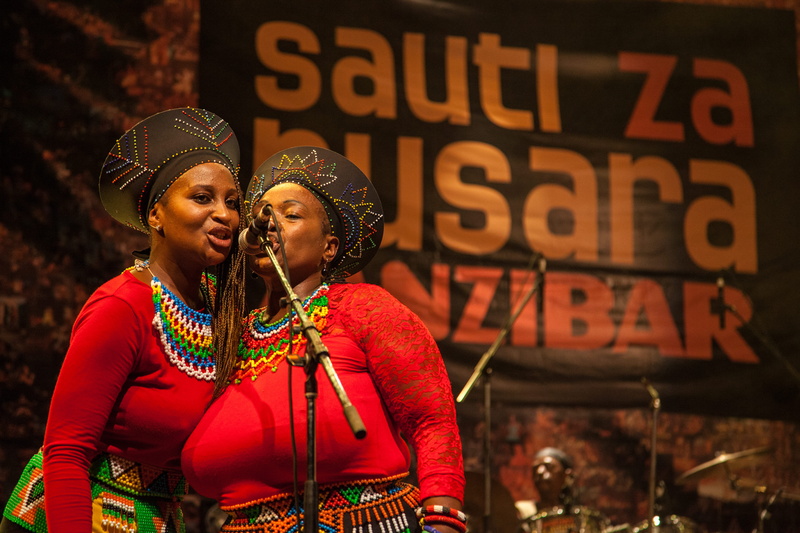 western script, zanzibar, adult, events, togetherness, womeninmusic, two people, colour, architecture, womeninpower, smiling, people, tanzania, 5K, music