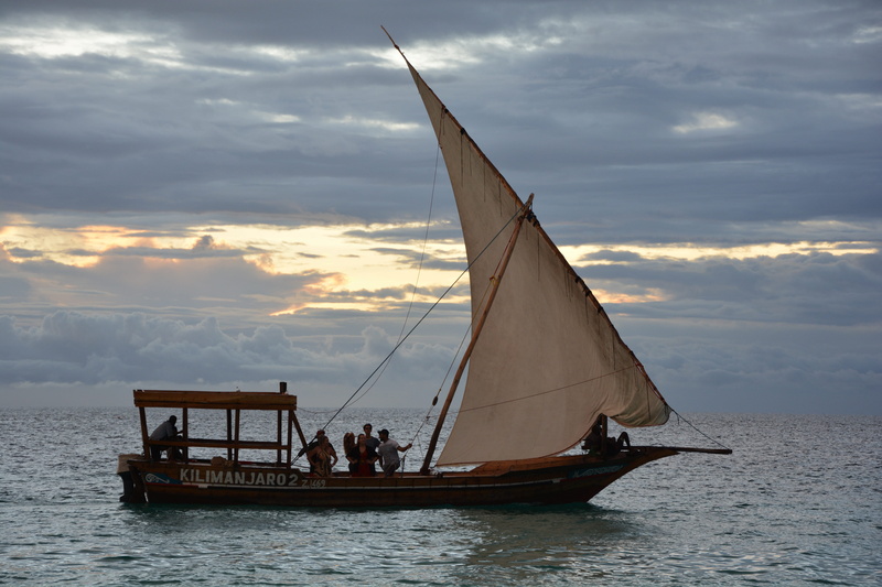 boat, waterfront, tanzania, zanzibar, lifestyles, sailing, cloud - sky, ship, men, water, sea, outdoors, transportation, travel, coast, group of people