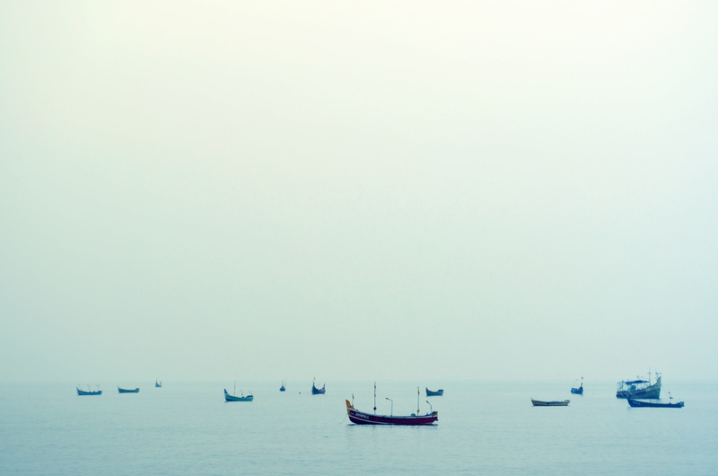 horizon, tranquility, fishermen, day, nautical vessel, anchored, sailing, beauty in nature, tranquil scene, water, no people, sky, transportation, mode of transportation