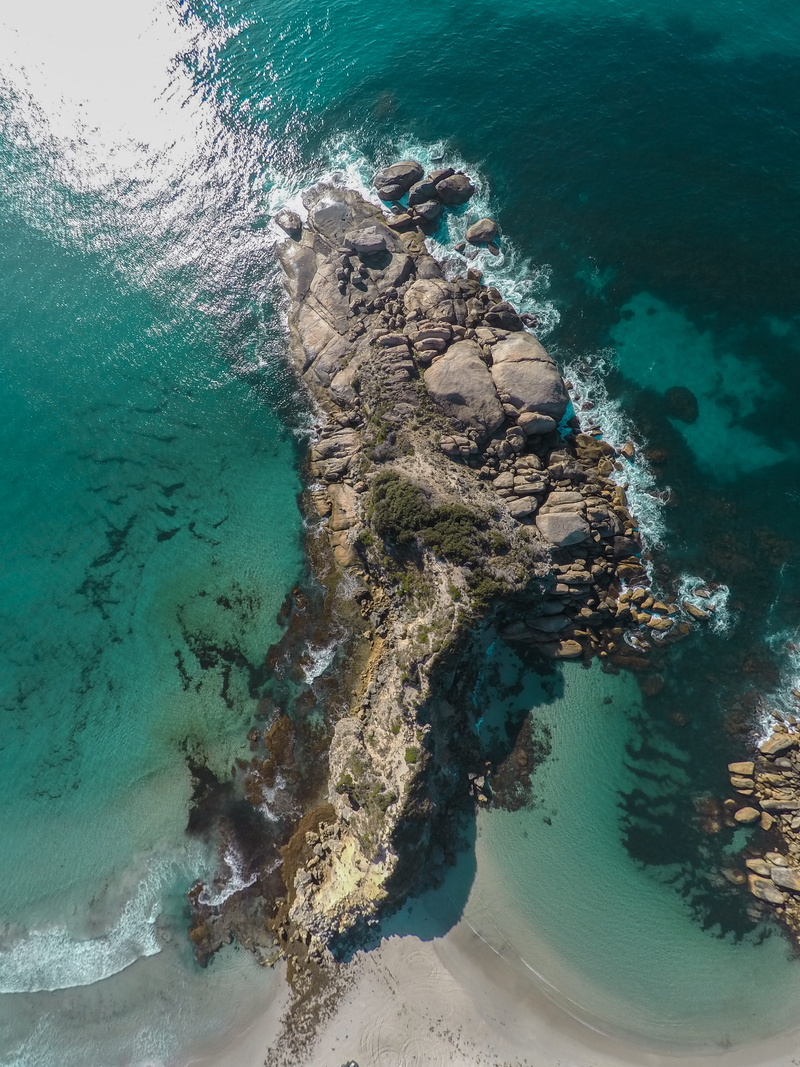 land, outdoors, motion, ocean, reef, no people, water, 4K, sea, coast, rock - object, scenery, beauty in nature, rock, aerial view, promontory, beach