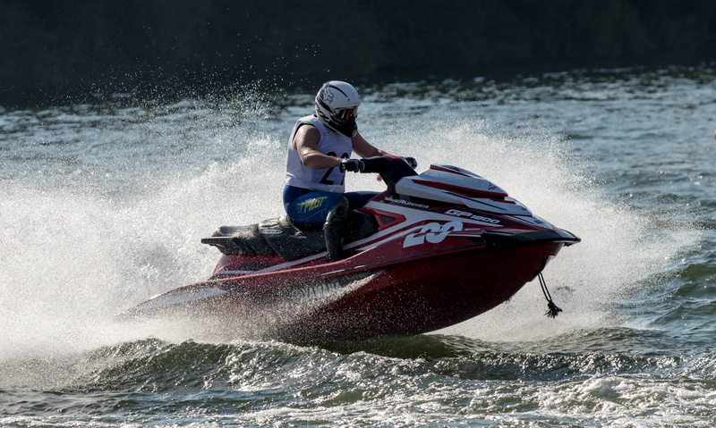 oar, speed, one person, nautical vessel, jetski race, splashing, power in nature, adult, effort, helmet, motion, racing, adventure, leisure activity, sea