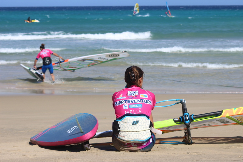 outdoors, sport, people, summer, fuerteventura, hobbies, land, aquatic sport, girl, real people, holiday, surfboard, sun, nature, surfers, horizon, costa