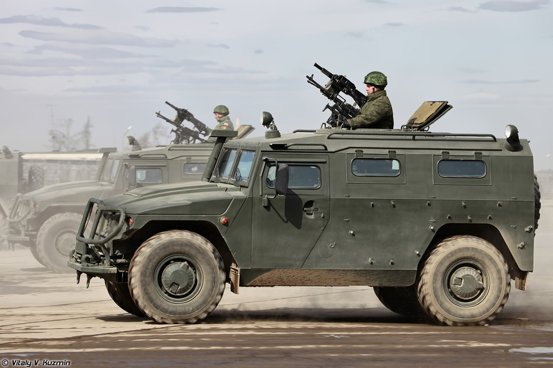 government, full length, nature, day, machine, jeep, mode of transportation, car, sky, Tiger, motor vehicle, men, uniform, lifestyles, army, one person