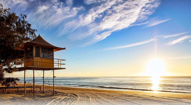 outdoors, landscape, no people, beauty in nature, beach, scenics - nature, sky, tranquility, horizon over water, lens flare, sunlight, lifeguard stands
