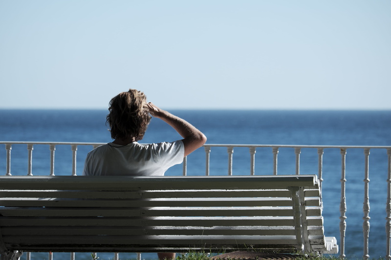 horizon over water, look, near, tranquil scene, one, bench, outdoors, rear view, white, beauty in nature, sitting, body, sky, man, blue, seaside, person