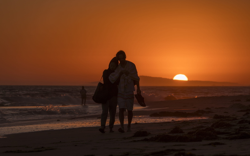 leisure activity, full length, outdoors, walks on the beach, sun, crystal cove beach, water, couple - relationship, united states, bonding, sky, orange county