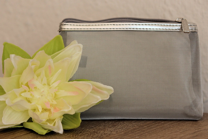 food and drink, make up bag, purse, beauty in nature, clothing, cleaning, close-up, studio shot, flower head, pouch, container, table, beach bag, nature