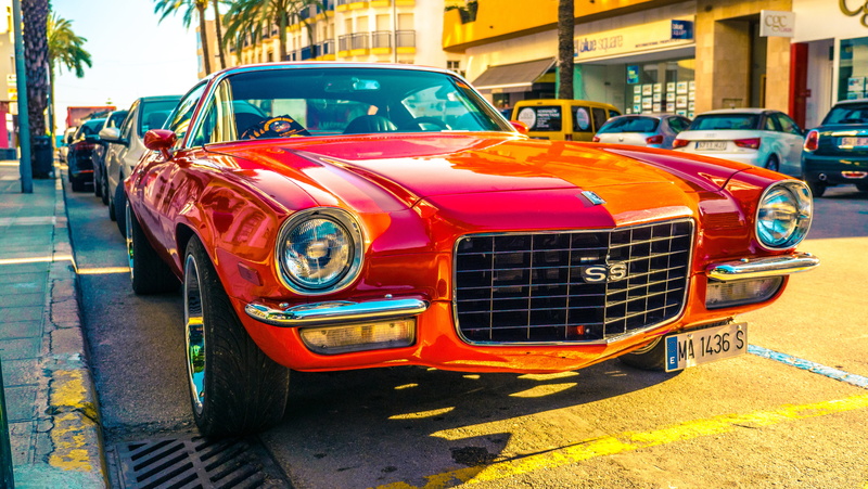 city street, transportation, building exterior, city, luxury, old-fashioned, 5K, oldtimer, spain, red, waves, motor vehicle, car, street, sea, sunlight