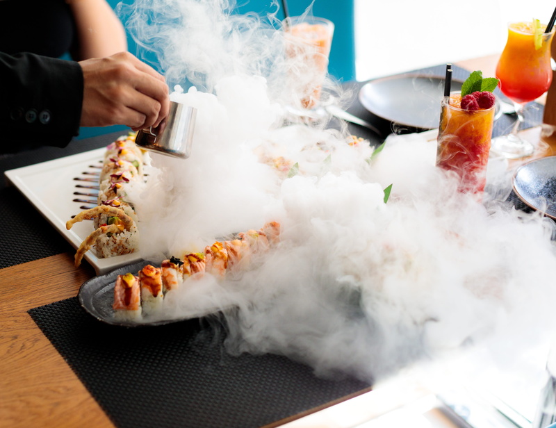 smoke - physical structure, table, british food blogger, human, chinese, food and drink, freshness, human body part, wedding cake, smokey, london, real people