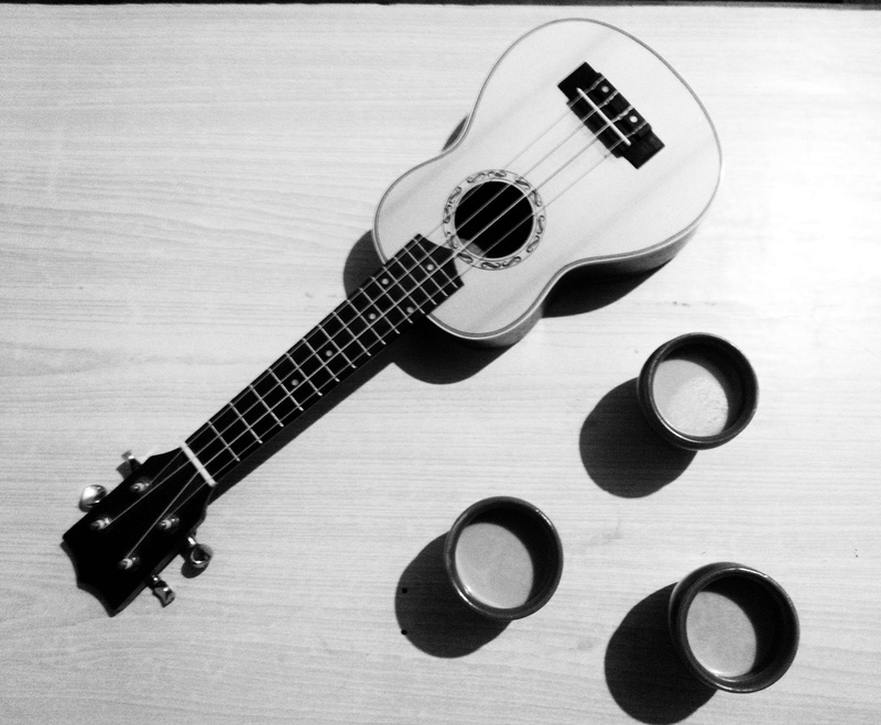 table, string instrument, tea, coffee, close-up, guitar, bnw, music, woodwind instrument, single object, still life, paper, arts culture and entertainment