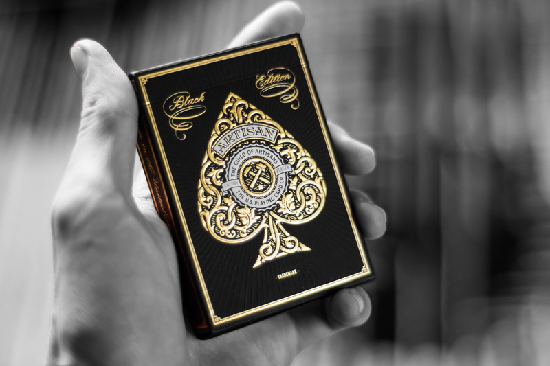 close-up, hand, art and craft, indoors, playing cards, bnw splash, nikon, badge, day, holding, single object, showing, representation, human body part