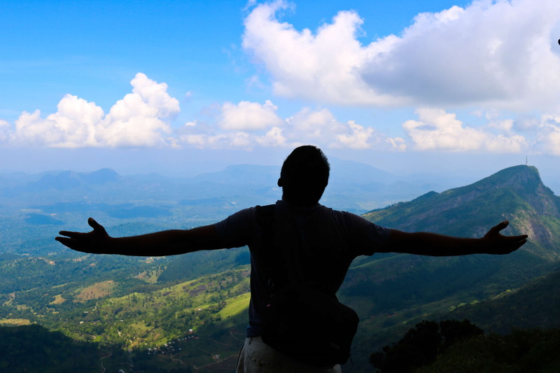cloud - sky, human arm, mountain, limb, arms outstretched, rear view, one person, standing, sky, lk srilanka travelphotography, non-urban scene, leisure activity