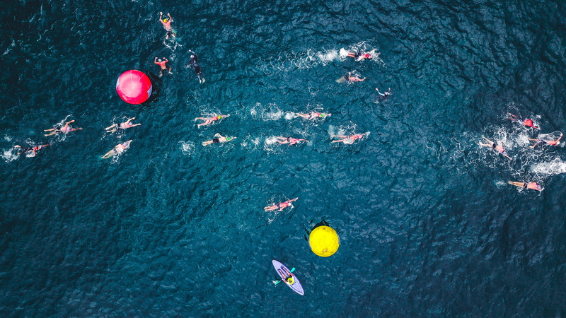 birds eye view, buoy, seascape, real people, athletes, waterfront, daytime, sea, scenics - nature, leisure activity, day, floating on water, beauty in nature