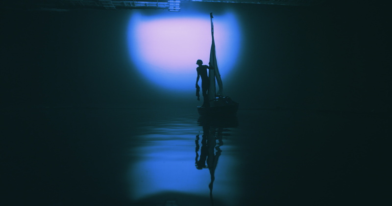 purple, nightlife, dark, reflection, standing, silhouette, film stills, indoors, spotlight, illuminated, water, stage, stage - performance space, occupation