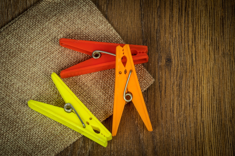 wooden, hand saw, wood - material, clip, object, high angle view, clothesline, yellow, group of objects, work tool, close-up, hand tool, tool, still life