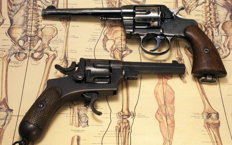 social issues, handgun, equipment, variation, crime, 2K, law, weapon, no people, wood - material, retro styled, hand saw, sign, rifle, communication, aggression