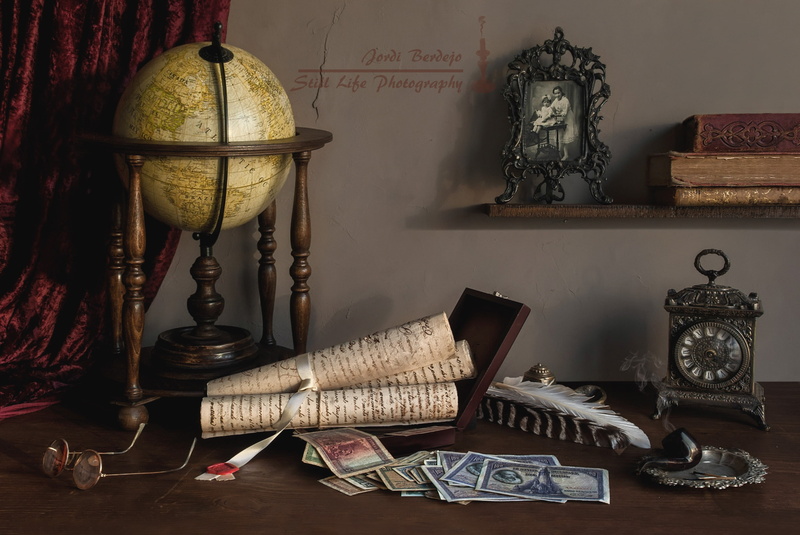 2K, pen, scrolls, watch, photo, glasses, tube, money, globe, books, still life
