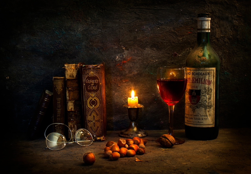 fire, wine bottle, glasses, food, frames, eyeglasses, food and drink, burning, indoors, refreshment, household equipment, A special occasion, alcohol, books