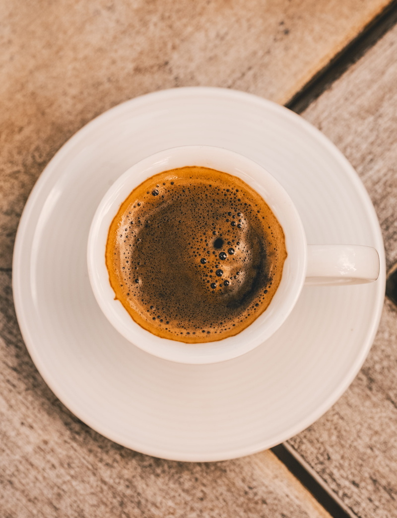 furniture, mug, indoors, food and drink, freshness, ceramic, cafe, restaurant, frothy drink, espresso, coffee - drink, table, grand cayman, plate, food