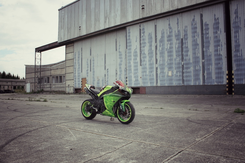 real people, day, mode of transportation, building exterior, building, motorcycle, built structure, Supersport, city, bike, sports, the sky, nature, the building