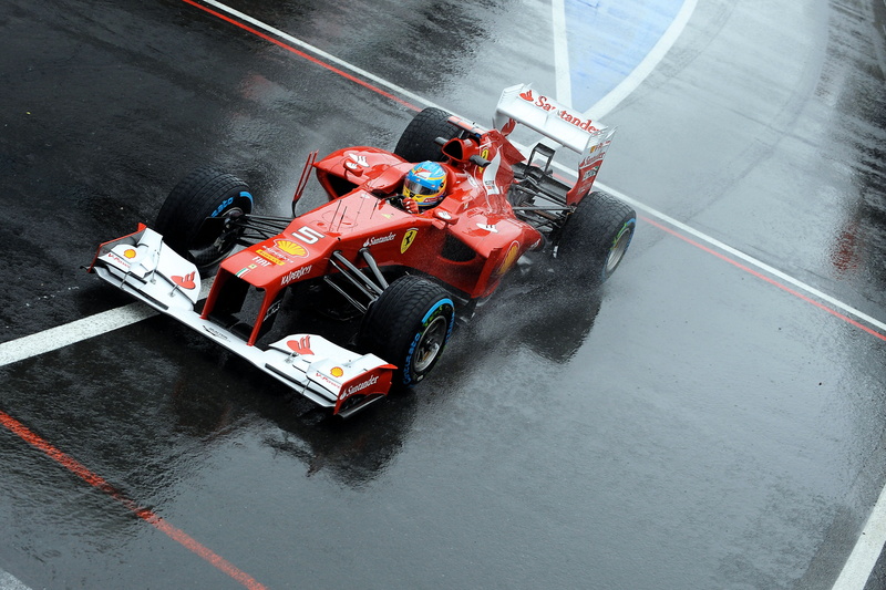transportation, red, people, high angle view, land vehicle, sports race, competition, outdoors, racecar, white, motorsport, auto racing, speed, rain, the car