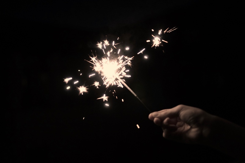 event, illuminated, motion, exploding, arts culture and entertainment, celebration, star sprayer, firework - Man Made Object, blurred motion, black background