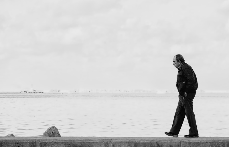 outdoors, tranquility, sky, sea, water, black and white, real people, contemplation, looking at view, 4K, egypt, man, mid adult, standing, adult, pier
