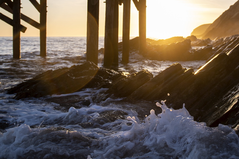 hour, outdoors, dawn, sunrise, horizon over water, land, nature, flowing water, sunset, water, tranquility, sea, boulders, seawaves, golden, beauty in nature