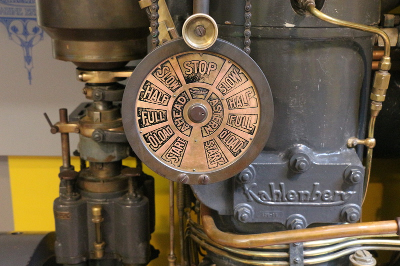 text, machinery, wristwatch, water, vehicle interior, building, gauge, clock tower, locomotive, machine part, architecture, control, machine, steam engine