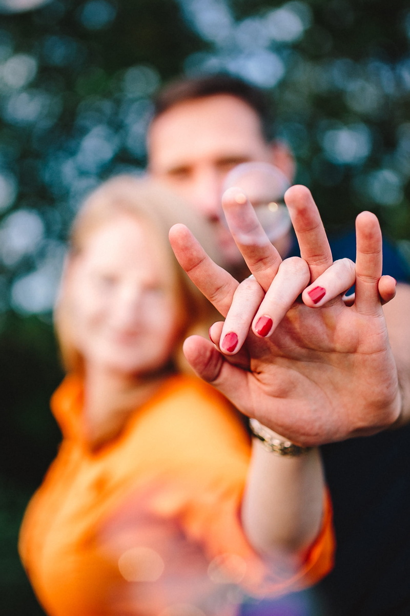 young, outdoors, two people, hand, men, girlfriend, lifestyles, outdoor, together, portrait, human face, relationship, focus on foreground, gesturing, females
