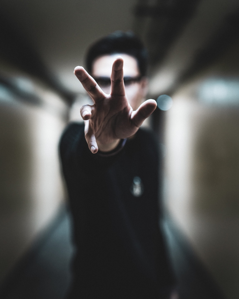 shallow, pointing, finger, adult, body part, right, indoors, human finger, focus, one person, hand, day, hand sign, front view, gesturing, focus on foreground