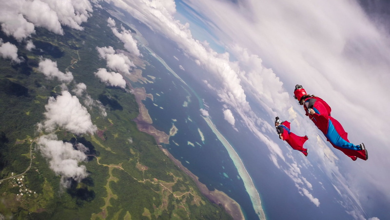 extreme sports, island, pilots, parachute, 1080P, wingsuit, container, sea, camera, helmet, clouds, shadows, formation