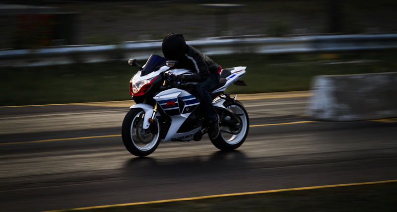 riding, outdoors, road, helmet, sport, mode of transportation, transportation, motorcyclist, travel, land vehicle, on the move, driving, movement, speed