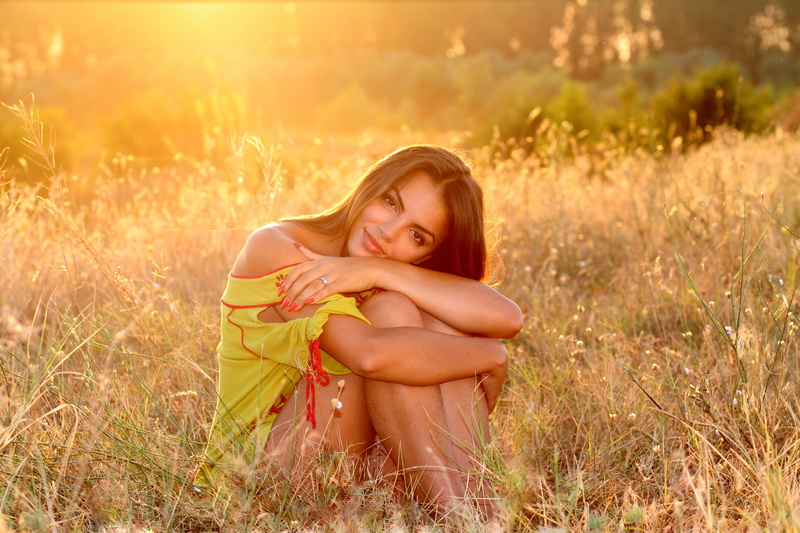 nature, beauty, women, in the evening, smiling, girl, hair, brown eyes, adolescence, plant, full length, sitting, yellow, sunset, adults only, emotion