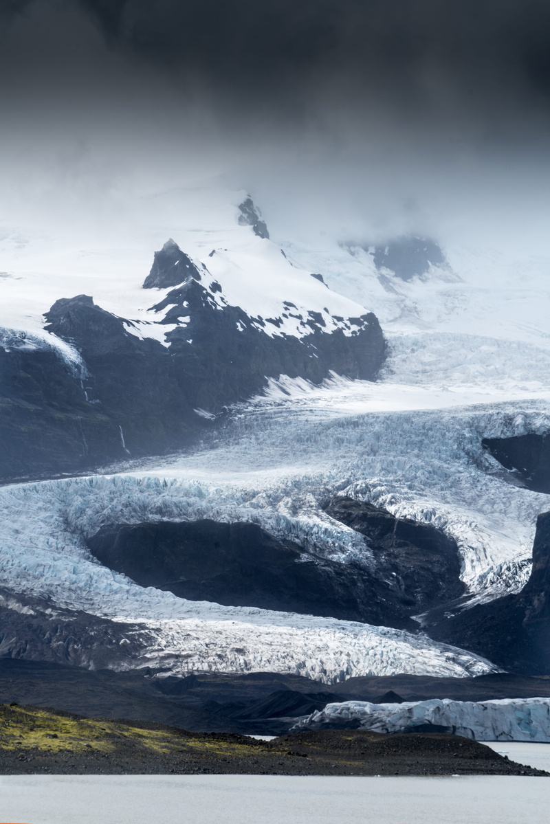 tranquil scene, dark, mountain, beauty in nature, mountains, iceberg, scenics - nature, aerial, snowcapped mountain, covered, environment, non-urban scene