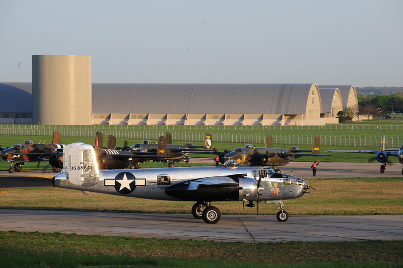 sky, real people, building exterior, incidental people, military, World War II, men, 1080P, airport, travel, Mitchell, vehicle, outdoors, black, architecture