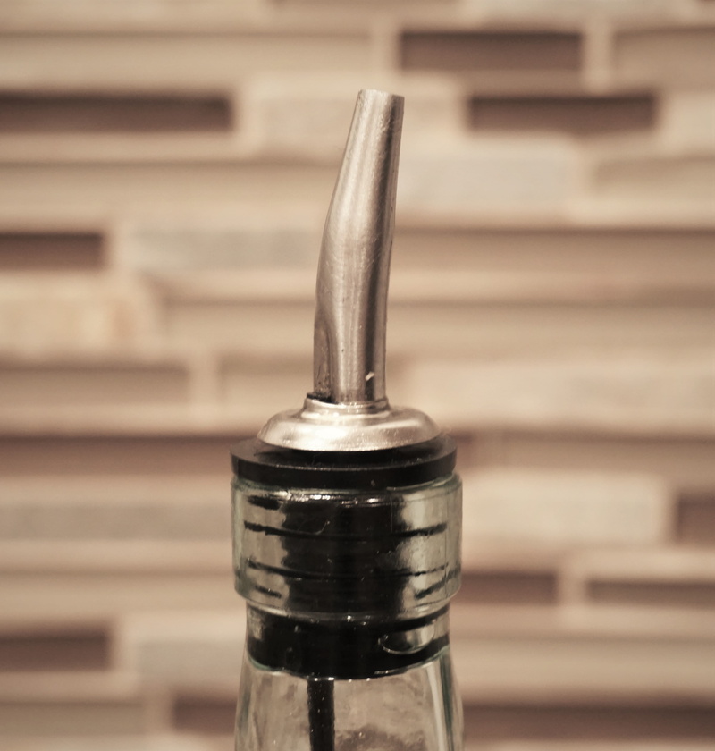 indoors, focus on foreground, oil pourer, oil bottle, still life, 4K, fence, old, control, bottle, architecture, no people, law, legal system, industry