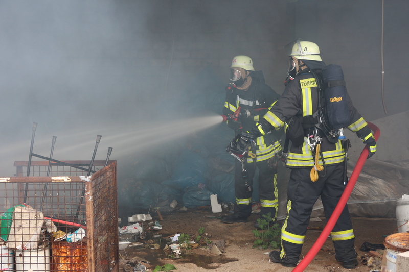 outdoors, emergency services occupation, protection, headwear, healthcare and medicine, brand, rescue, firefighter, responsibility, real people, fire hose
