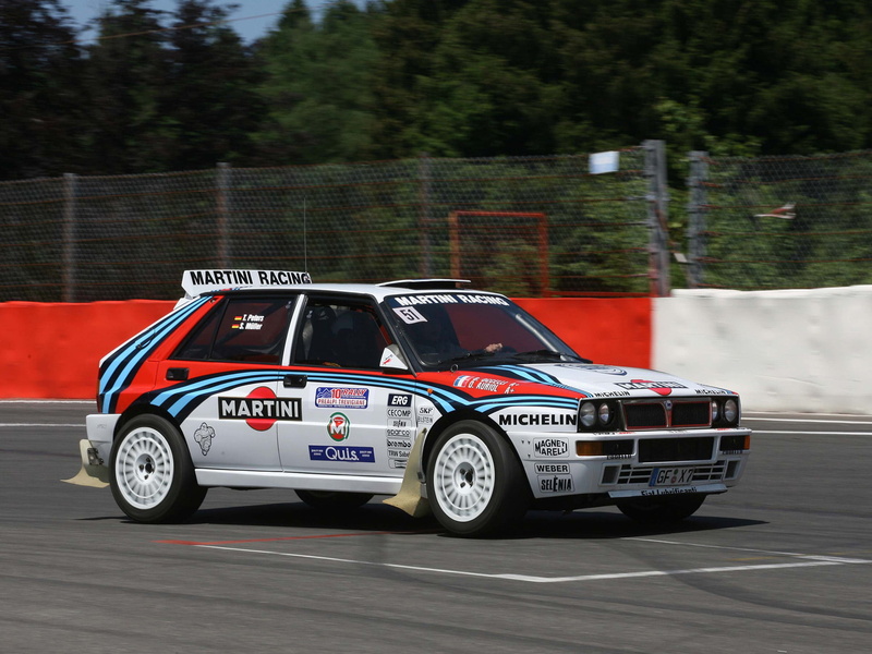 security, motion, integrale, transportation, red, protection, nature, motor vehicle, land vehicle, rally, hatchback, plant, day, speed, no people, Lancia