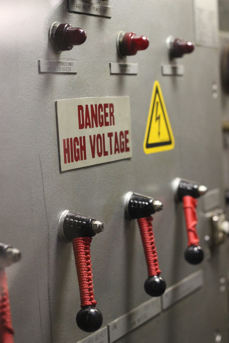 indoors, attention, high voltage, 5K, no people, control panel, communication, warning sign, knob, safety, console, handle, current, metal, risk, western script