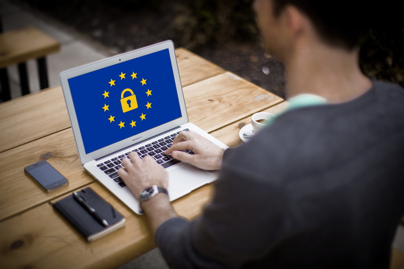 using laptop, man, legislation, businessman, privacy, high angle view, controller, gdpr, over the shoulder view, protection, corporate business, technology
