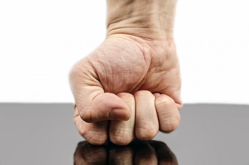 isolated, senior adult, indoors, gesture, table, wrinkled, violence, male, finger, holding, punch, hand, fight, s, human finger, strength, symbol, hit