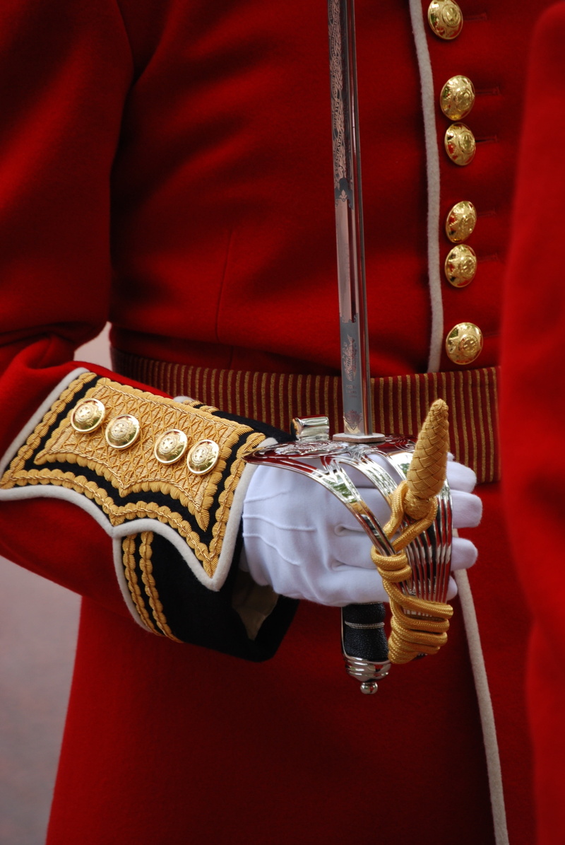 musical instrument, clothing, close-up, coat, performance, historical, soldier, traditional clothing, ceremonial, red, one person, british army, history