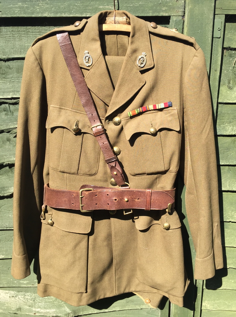 armed Forces, real people, outdoors, one person, army, 2K, suit, hanging, close-up, military, clothing, coathanger, history, mannequin, men, brown, british