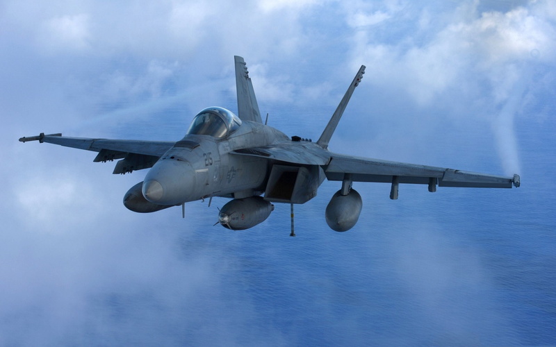 motion, speed, Aircraft, no people, landing - touching down, government, mode of transportation, airplane, air vehicle, Jet Fighters, piloting, commercial airplane