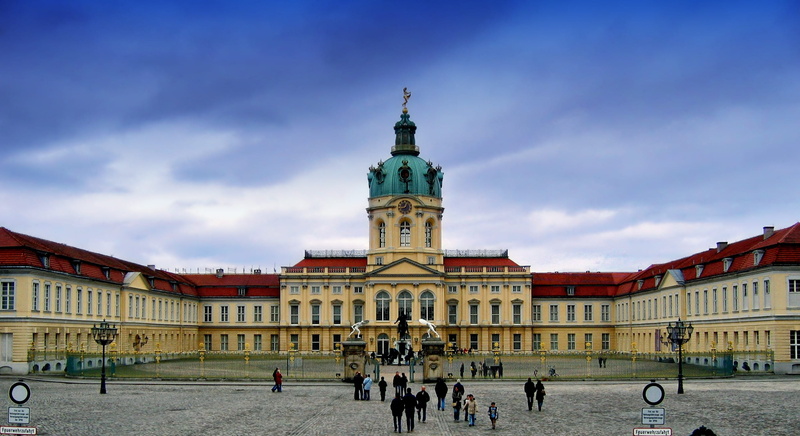 incidental people, people, historic, structure, city life, nature, buildings, landmark, clouds, outside, travel destinations, the past, sky, outdoors, travel