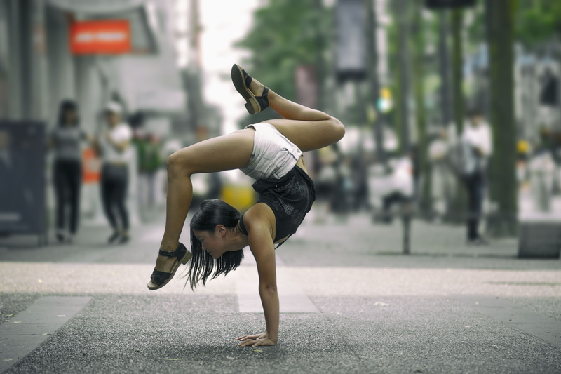 leisure activity, 2K, full length, urban, city, skill, young adult, gymnastics, young women, dancing, physical activity, one person, women outdoors, incidental people