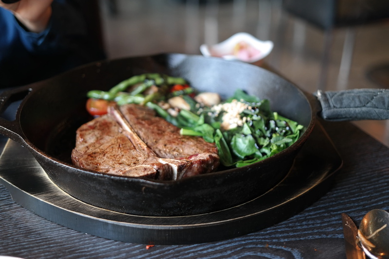 preparation, wellbeing, frying, pan, close-up, black, skill and chocolate, one person, table knife, meat, meal, brown, table, dinner, kitchen utensil, focus on foreground