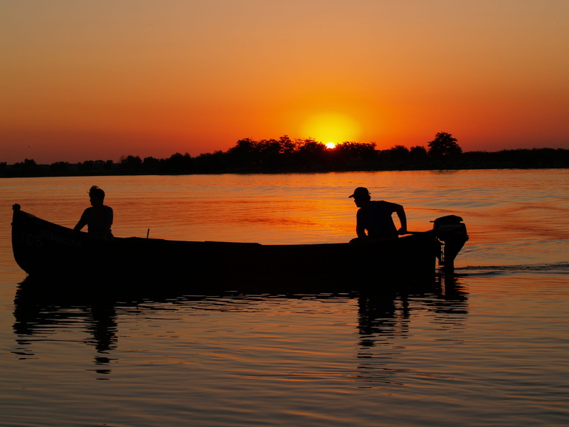 tranquility, 2K, danube delta, boat, silhouette, beauty in nature, scenics - nature, nautical vessel, water, outdoors, sunset, waterfront, men, romania